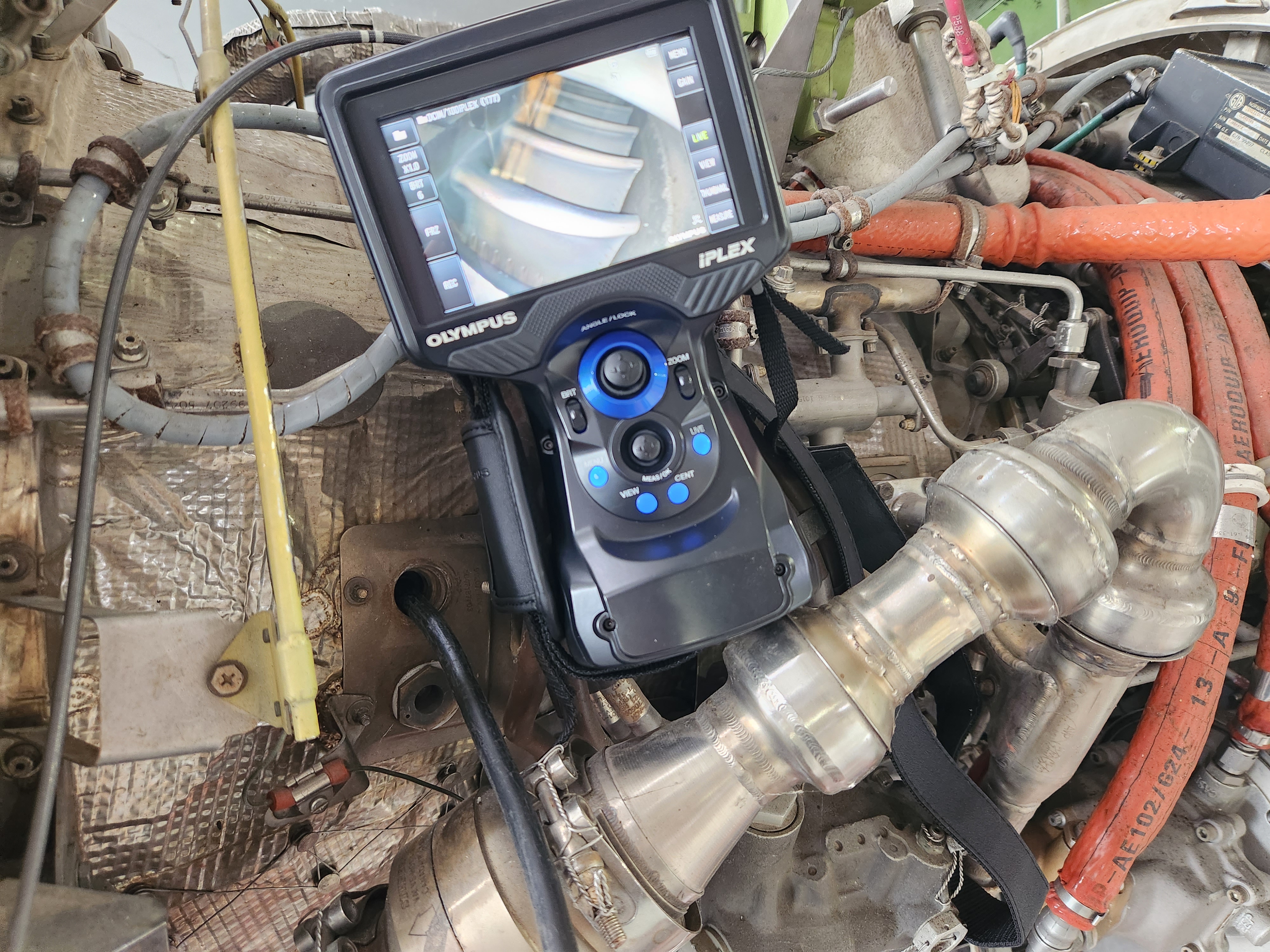 Borescope display showing turbine blade condition during jet engine inspection