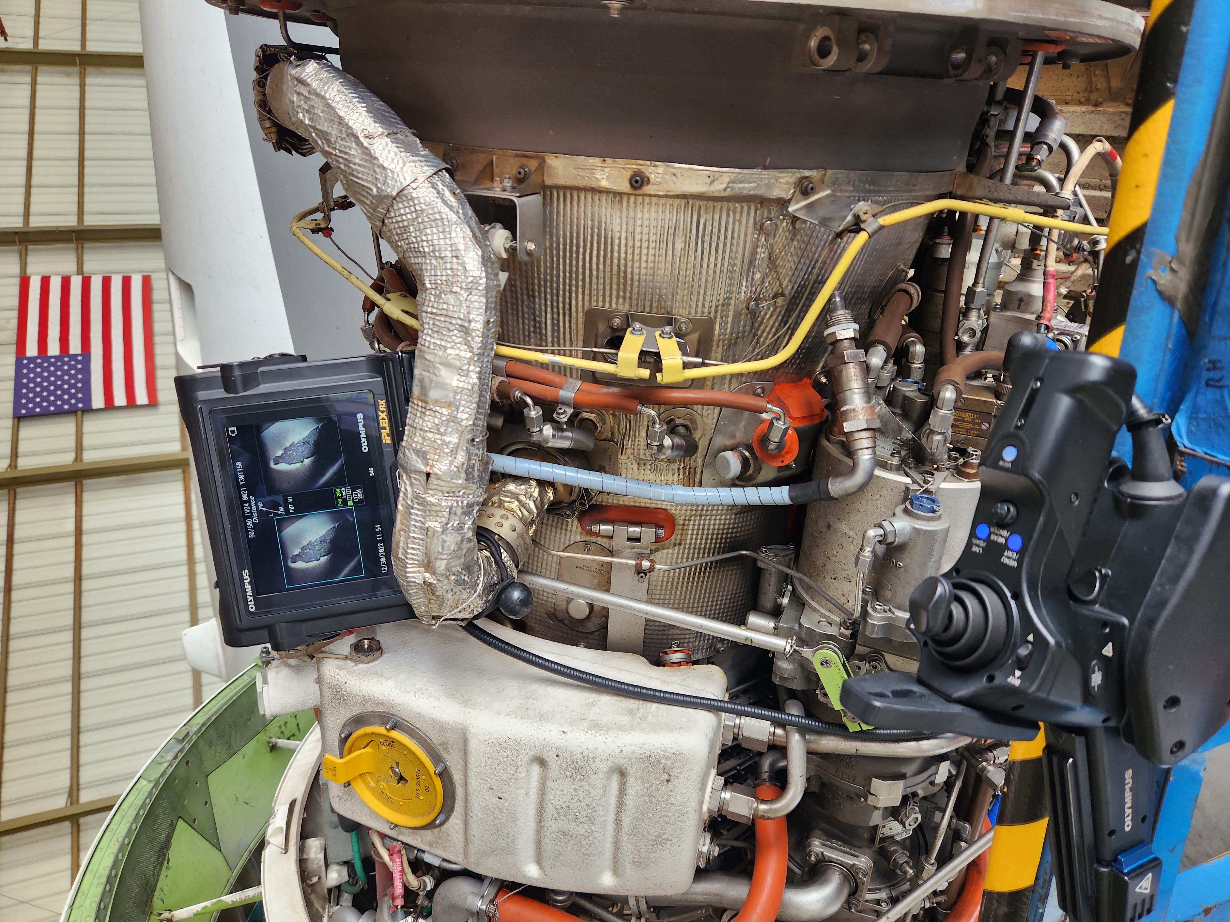 Olympus iPLEX borescope in use during a live engine scope session